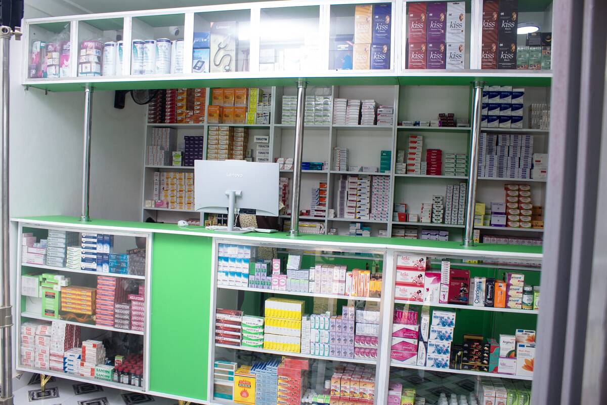 Aciga Venture Pharmacy counter with first-aid and wellness stock