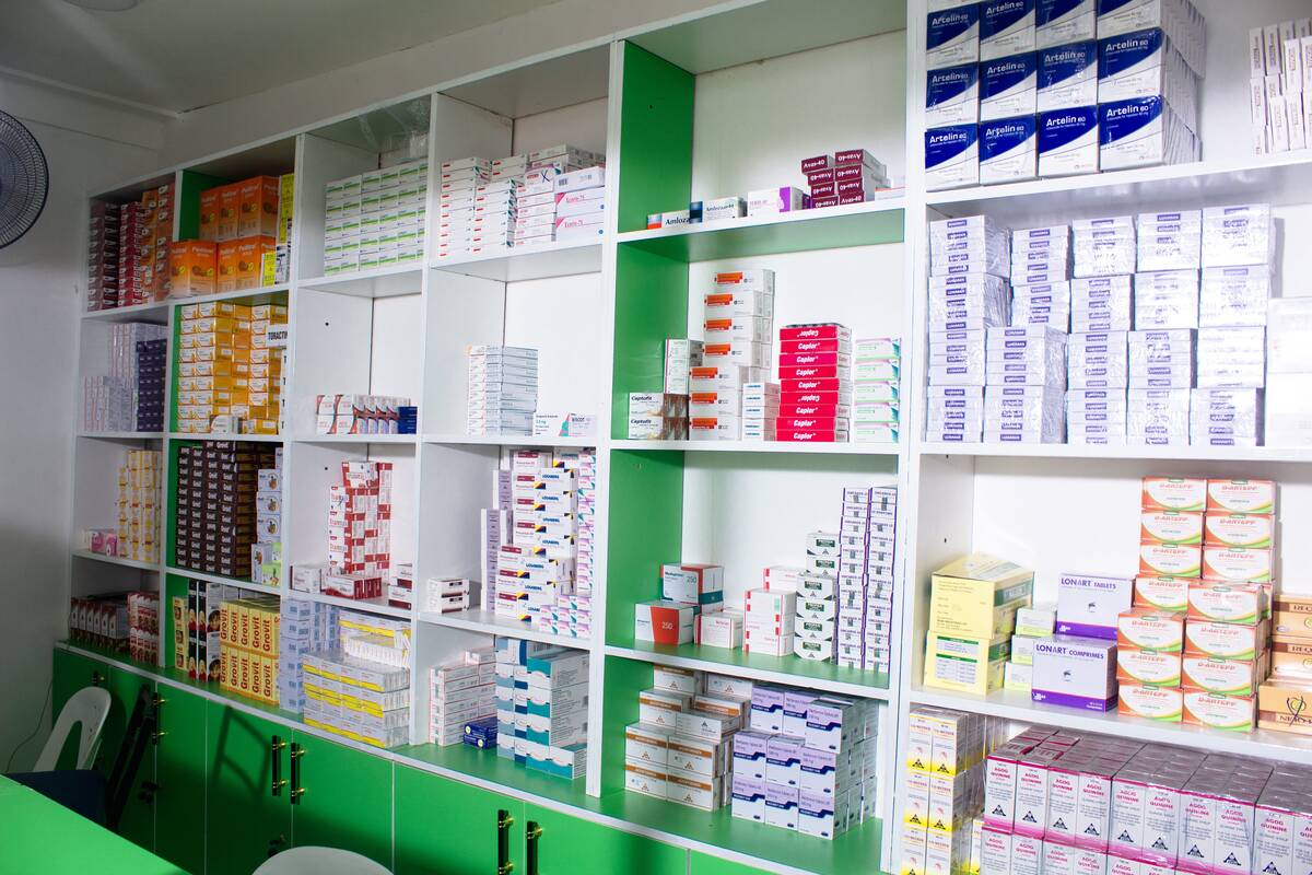Stocked shelves at Aciga Venture Pharmacy